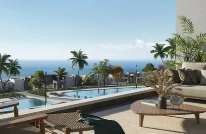 Chalet - 2 Bedrooms - 2 Bathrooms for sale in Jebal Resort - Al Ain Al Sokhna - Suez