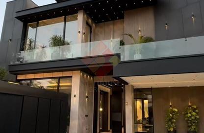 Villa - 6 Bedrooms - 7+ Bathrooms for sale in Palm Hills WoodVille - Al Wahat Road - 6 October City - Giza