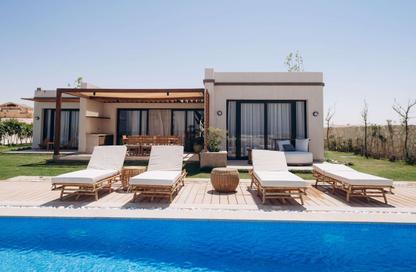Villa - 4 Bedrooms - 4 Bathrooms for sale in Beit Al Bahr - Sidi Heneish - North Coast