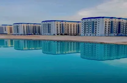 Chalet - 2 Bedrooms - 2 Bathrooms for sale in Latin District - New Alamein City - Al Alamein - North Coast