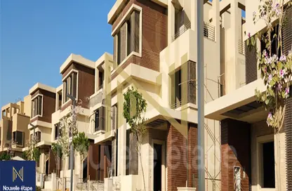 Twin House - 4 Bedrooms - 4 Bathrooms for sale in New Giza - Cairo Alexandria Desert Road - 6 October City - Giza