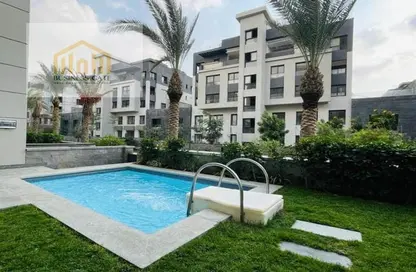 Apartment - 4 Bedrooms - 2 Bathrooms for sale in Trio Gardens - 5th Settlement Compounds - The 5th Settlement - New Cairo City - Cairo