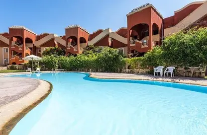 Chalet - 2 Bedrooms - 2 Bathrooms for sale in Bungalows North Coast - Bungalows - Markaz Al Hamam - North Coast