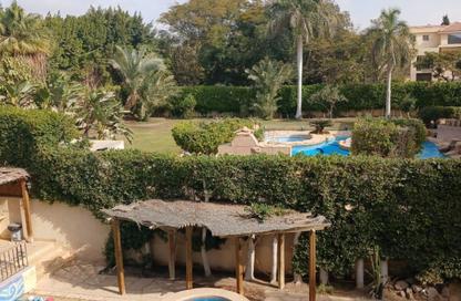 Villa - 5 Bedrooms - 6 Bathrooms for sale in Mena Garden City - Al Motamayez District - 6 October City - Giza