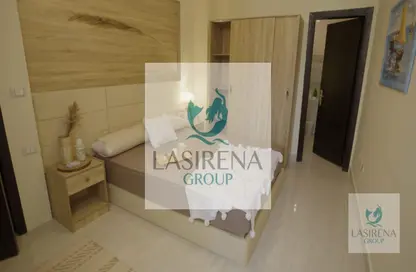 Duplex - 4 Bedrooms - 3 Bathrooms for sale in Lasirena Palm Beach - Al Ain Al Sokhna - Suez