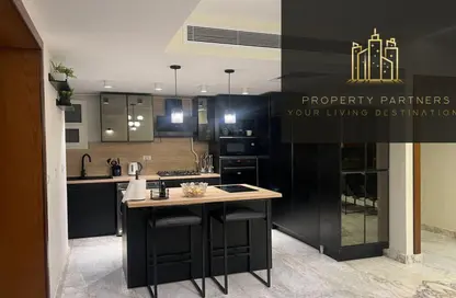 Apartment - 2 Bedrooms - 3 Bathrooms for sale in October Plaza - 6 October Compounds - 6 October City - Giza