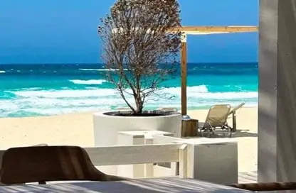 Chalet - 2 Bedrooms - 2 Bathrooms for sale in Ramla Lakeside - Qesm Ad Dabaah - North Coast