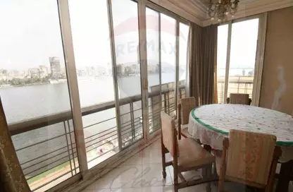 Apartment - 4 Bedrooms - 2 Bathrooms for sale in Nile St. - Dokki - Giza