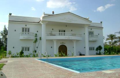 Villa - 4 Bedrooms - 4 Bathrooms for sale in Village West - Sheikh Zayed Compounds - Sheikh Zayed City - Giza