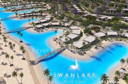 Villa - 4 Bedrooms - 4 Bathrooms for sale in Swan Lake North Coast - Qesm Ad Dabaah - North Coast