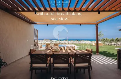Twin House - 4 Bedrooms - 5 Bathrooms for sale in Beit Al Bahr - Sidi Heneish - North Coast