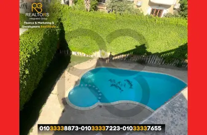 Villa - 5 Bedrooms - 4 Bathrooms for sale in Mena Garden City - Al Motamayez District - 6 October City - Giza