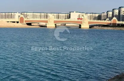 Chalet - 4 Bedrooms - 4 Bathrooms for sale in Latin District - New Alamein City - Al Alamein - North Coast
