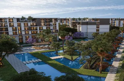 Apartment - 4 Bedrooms - 3 Bathrooms for sale in Tesla Residence - Al Wahat Road - 6 October City - Giza