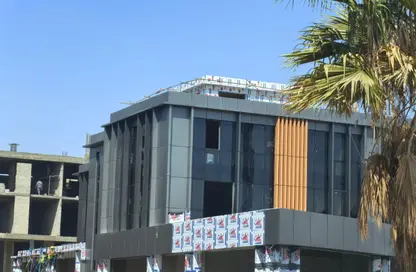 Office Space - Studio - 2 Bathrooms for sale in Mohamed Naguib Axis - North Investors Area - New Cairo City - Cairo