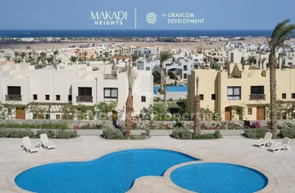 Chalet - 2 Bedrooms - 2 Bathrooms for sale in Makadi Orascom Resort - Makadi - Hurghada - Red Sea