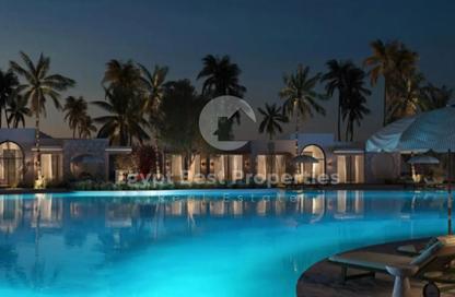 Villa - 4 Bedrooms - 4 Bathrooms for sale in Beit Al Bahr - Sidi Heneish - North Coast