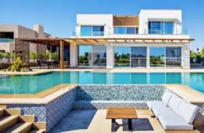 Chalet - 2 Bedrooms - 3 Bathrooms for sale in Hacienda Waters - Qesm Ad Dabaah - North Coast