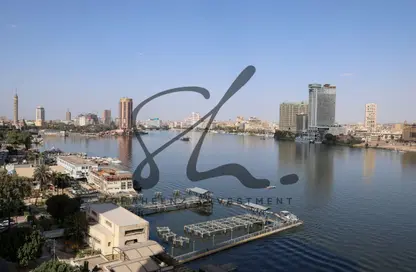 شقة - 4 غرف نوم - 4 حمامات للايجار في شارع النيل - الدقي - الجيزة