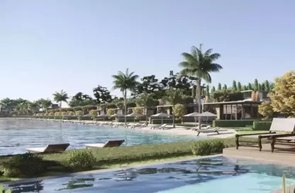 Chalet - 2 Bedrooms - 2 Bathrooms for sale in Beit Al Bahr - Sidi Heneish - North Coast
