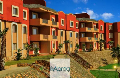 Chalet - 2 Bedrooms - 2 Bathrooms for sale in Bungalows - Markaz Al Hamam - North Coast