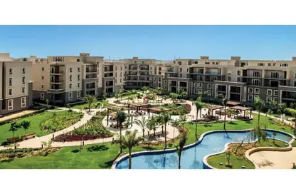 Apartment - 2 Bedrooms - 3 Bathrooms for sale in October Plaza - 6 October Compounds - 6 October City - Giza