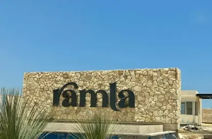 Chalet - 2 Bedrooms - 2 Bathrooms for sale in Ramla Lakeside - Qesm Ad Dabaah - North Coast