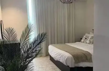 Apartment - 3 Bedrooms - 3 Bathrooms for sale in Karma Residence - 16th District - Sheikh Zayed City - Giza