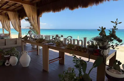 Chalet - 2 Bedrooms - 2 Bathrooms for sale in Ramla Lakeside - Qesm Ad Dabaah - North Coast