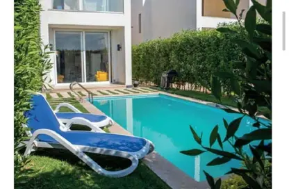 Villa - 3 Bedrooms - 3 Bathrooms for sale in Golf Porto Marina - Al Alamein - North Coast