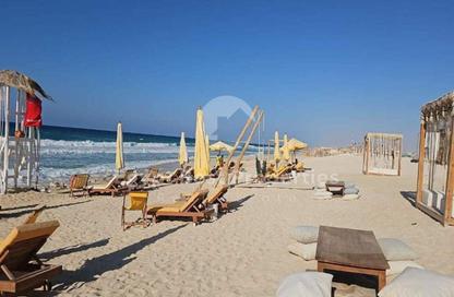 Chalet - 2 Bedrooms - 2 Bathrooms for sale in Hacienda Waters - Qesm Ad Dabaah - North Coast