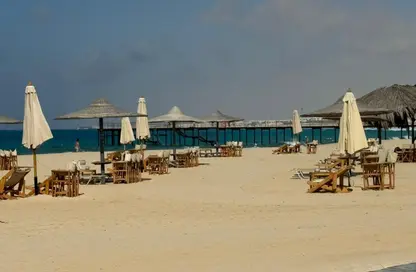 Chalet - 4 Bedrooms - 5 Bathrooms for sale in Ramla Lakeside - Qesm Ad Dabaah - North Coast