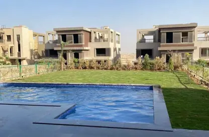 Twin House - 4 Bedrooms - 4 Bathrooms for sale in New Giza - Cairo Alexandria Desert Road - 6 October City - Giza