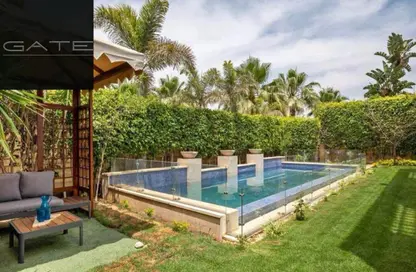 Villa - 3 Bedrooms - 4 Bathrooms for sale in Karmell - New Zayed City - Sheikh Zayed City - Giza