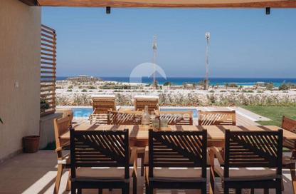 Villa - 4 Bedrooms - 5 Bathrooms for sale in Beit Al Bahr - Sidi Heneish - North Coast