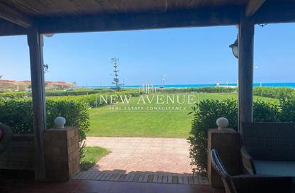Chalet - 3 Bedrooms - 2 Bathrooms for sale in Gamaet Al Dewal El Arabeya Village - Markaz Al Hamam - North Coast
