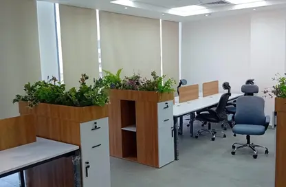 Office Space - Studio - 2 Bathrooms for rent in Cairo Festival City - North Investors Area - New Cairo City - Cairo