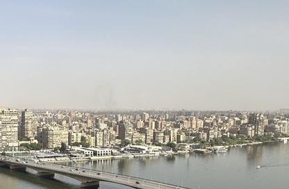 شقة - 4 غرف نوم - 4 حمامات للبيع في شارع كورنيش النيل - العجوزة - الجيزة