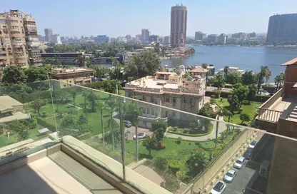 شقة - 3 غرف نوم - 3 حمامات للايجار في شارع النيل - الدقي - الجيزة