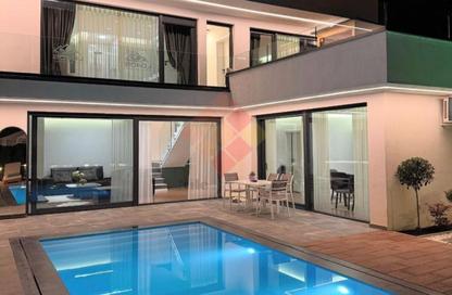 Villa - 6 Bedrooms - 7 Bathrooms for sale in Palm Hills Golf Extension - Al Wahat Road - 6 October City - Giza