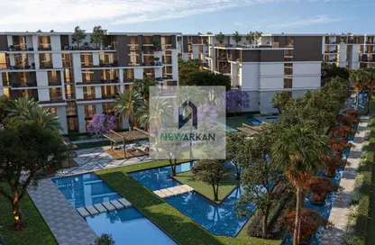 Apartment - 3 Bedrooms - 2 Bathrooms for sale in Tesla Residence - Al Wahat Road - 6 October City - Giza