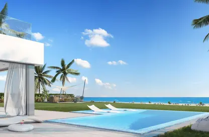 Chalet - 2 Bedrooms - 2 Bathrooms for sale in Beit Al Bahr - Sidi Heneish - North Coast