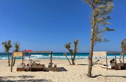 Duplex - 4 Bedrooms - 3 Bathrooms for sale in Beit Al Bahr - Sidi Heneish - North Coast