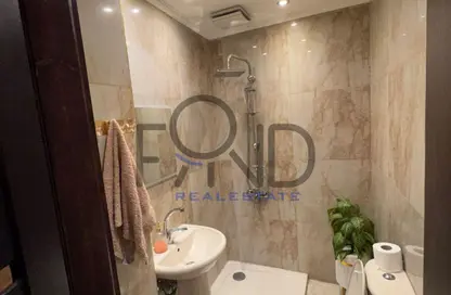 Apartment - 2 Bedrooms - 2 Bathrooms for sale in Mohamed Naguib Axis - Abou El Houl - New Cairo City - Cairo