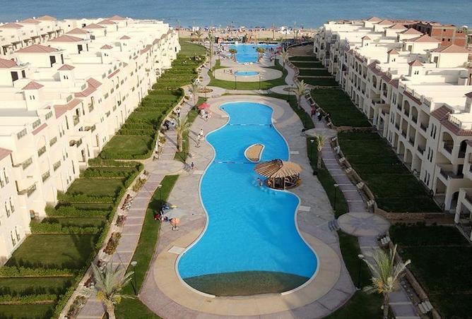 Duplex - 4 Bedrooms - 4 Bathrooms for sale in Lasirena Palm Beach - Al Ain Al Sokhna - Suez