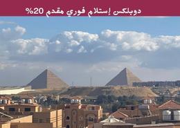 Duplex - 4 bedrooms for للبيع in Pyramids Hills - Cairo Alexandria Desert Road - 6 October City - Giza