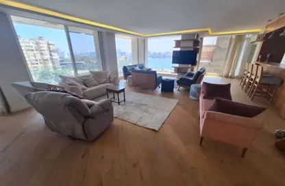 Apartment - 3 Bedrooms - 3 Bathrooms for rent in Nile St. - Dokki - Giza