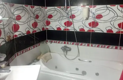 Apartment - 4 Bedrooms - 2 Bathrooms for sale in 10th District - Sheikh Zayed City - Giza