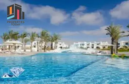 Chalet - 2 Bedrooms - 2 Bathrooms for sale in Hacienda Waters - Qesm Ad Dabaah - North Coast