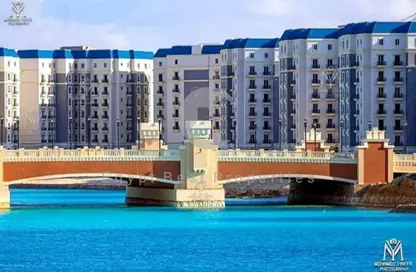 Chalet - 4 Bedrooms - 4 Bathrooms for sale in Downtown - New Alamein City - Al Alamein - North Coast